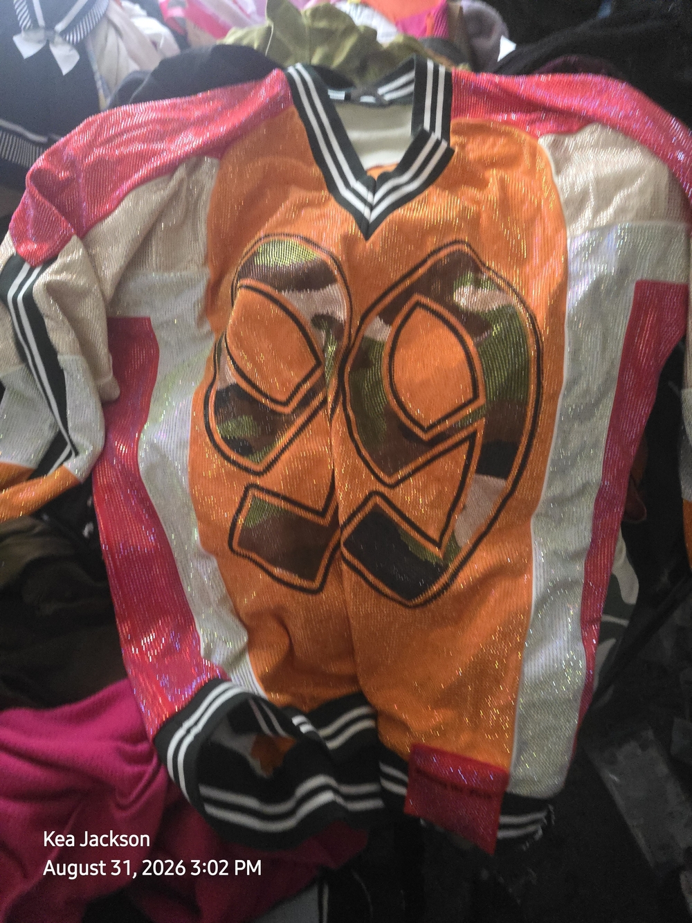 AKIRA Shimmery Orange & Pink Long-Sleeve Sparkle Top with '89' Graphic